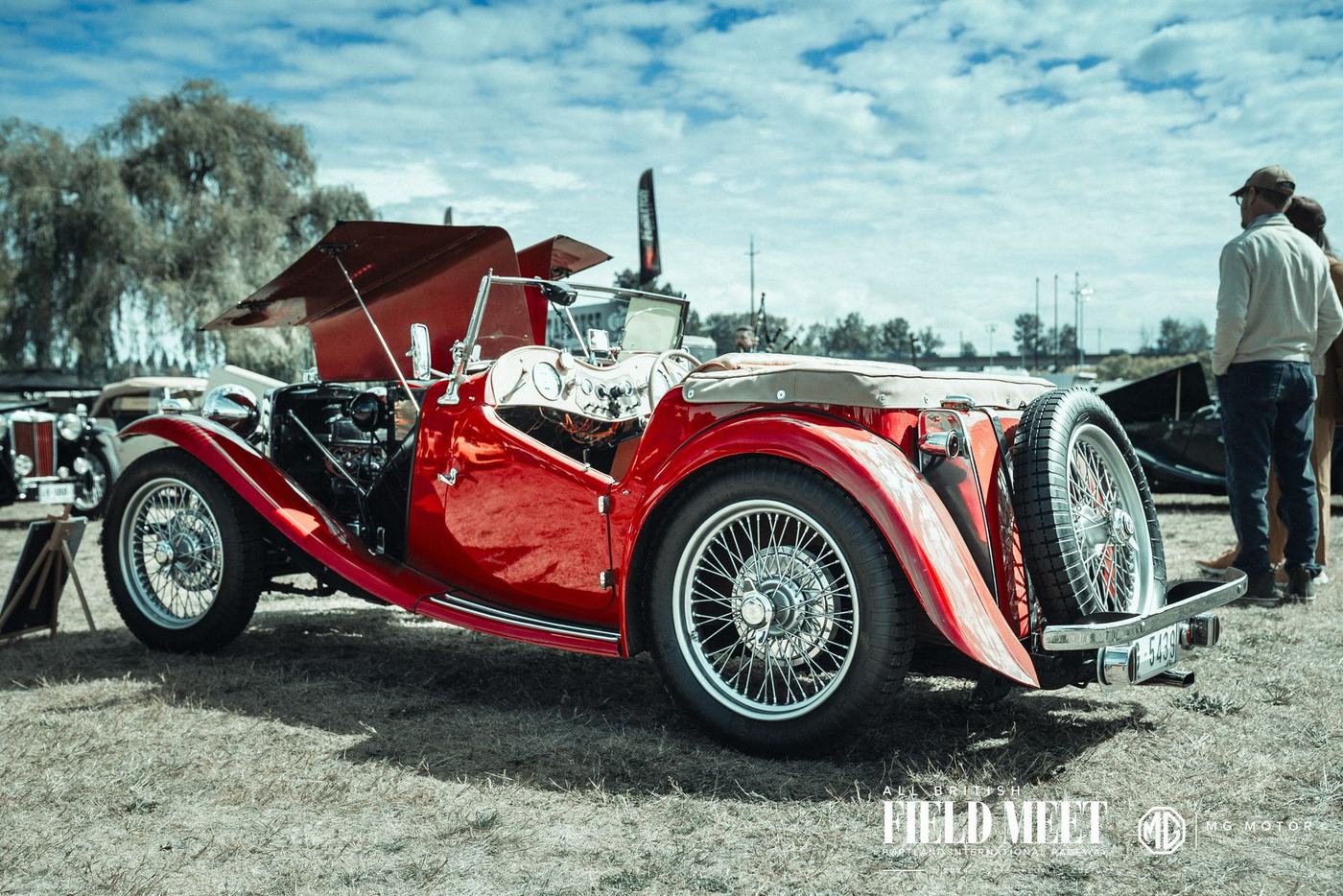 Red MG TC with bonnet open