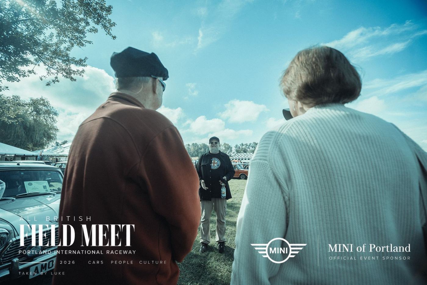 Club members talking on the field
