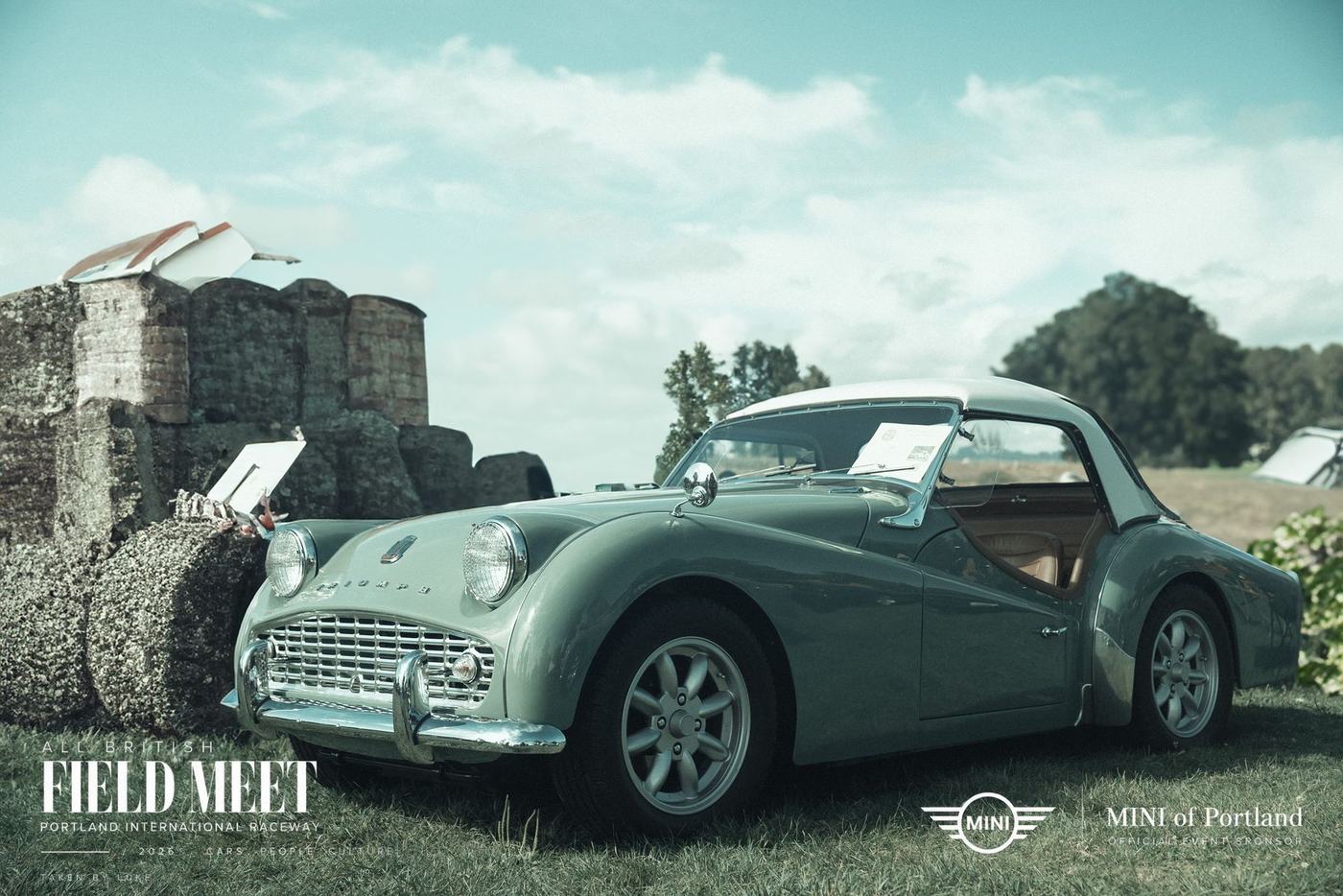 Triumph TR3 by a stone wall